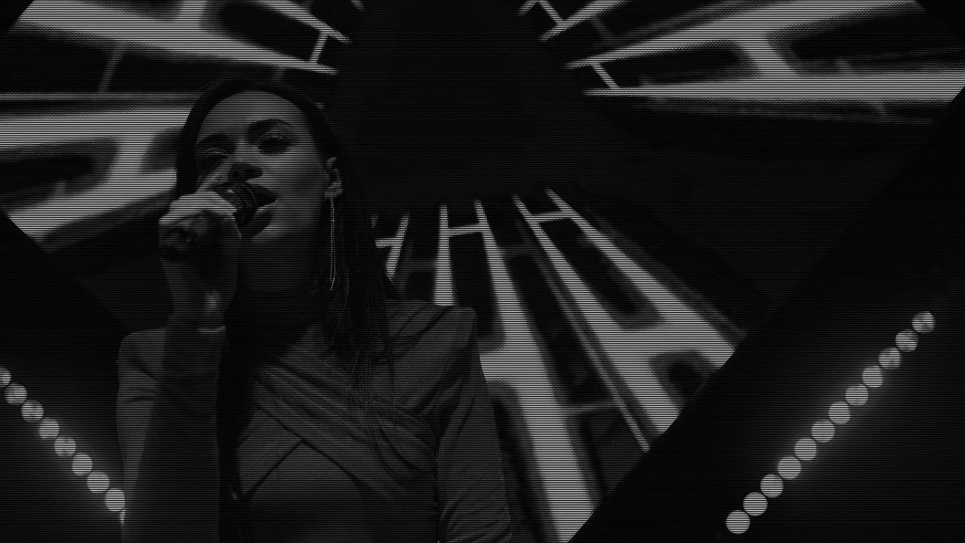 Performer on stage under stage lighting